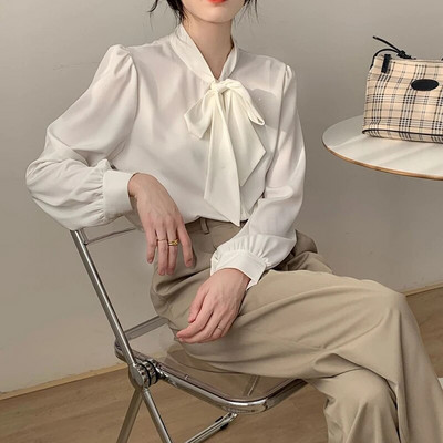 Kevadsuvi naiste elegantsed ja moodsad vibunööbid Sifonki särk Naiste pikkade varrukatega vaba vabaaja Naiste kardiganpluus