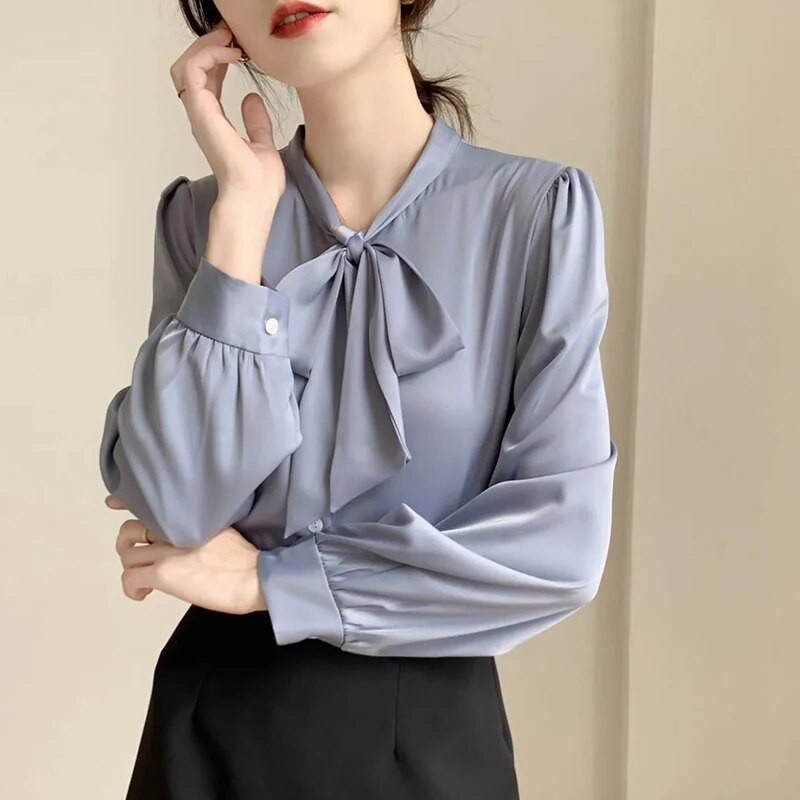 Kevadsuvi naiste elegantsed ja moodsad vibunööbid Sifonki särk Naiste pikkade varrukatega vaba vabaaja Naiste kardiganpluus