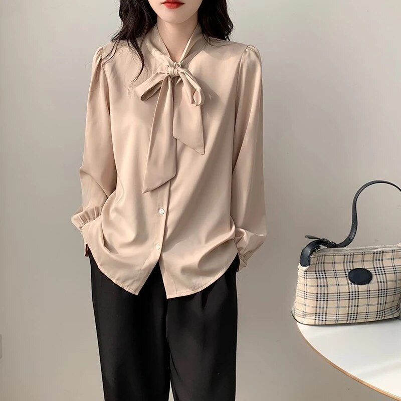 Kevadsuvi naiste elegantsed ja moodsad vibunööbid Sifonki särk Naiste pikkade varrukatega vaba vabaaja Naiste kardiganpluus