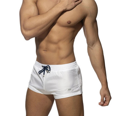 Nove muške kupaće hlače Klasične jednobojne kupaće hlače s tri točke koje se brzo suše, niskog struka Seksi sportske kratke hlače za surfanje na plaži