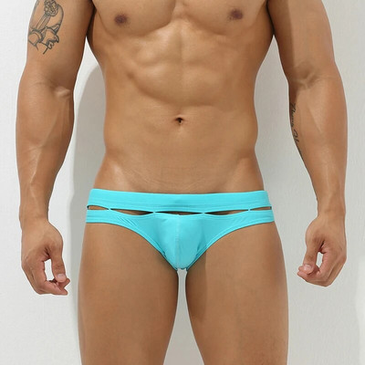 Hot Sale Ανδρικά μονόχρωμα σλιπ μαγιό Sexy Gay Hollow μπικίνι μαγιό μπλε του ουρανού Μαγιό χαμηλού ύψους Ma πέους πουγκί μπικίνι μαγιό XXL