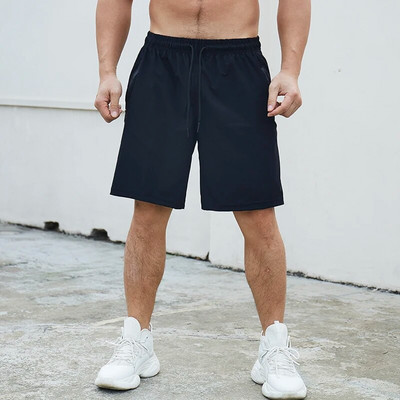 Υψηλής ελαστικότητας Άνδρες τρέξιμο τζόκινγκ Αθλητισμός Quick Dry σορτς Γυμναστήριο Γυμναστήριο Bodybuilding Προπόνηση Αναπνεύσιμο σορτς προπόνησης