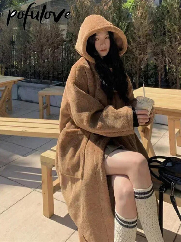 Báránygyapjú kabátok női gyapjú kapucnis kabát tehénhorn gomb bő kabát tél meleg női középhosszú koreai vastag felsőkabát