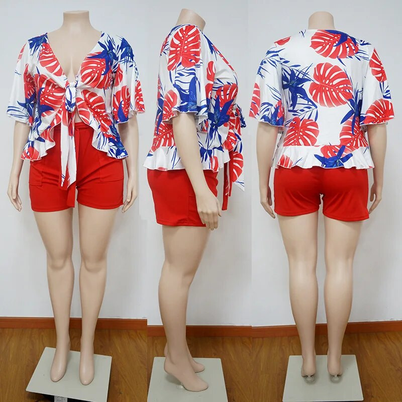 Didesnio dydžio dviejų dalių rinkiniai Moteriški gėlėmis marginti viršutiniai marškiniai ir trumpos kelnės Moteriškos mados laisvalaikio 2023 m. vasaros derinimo rinkiniai