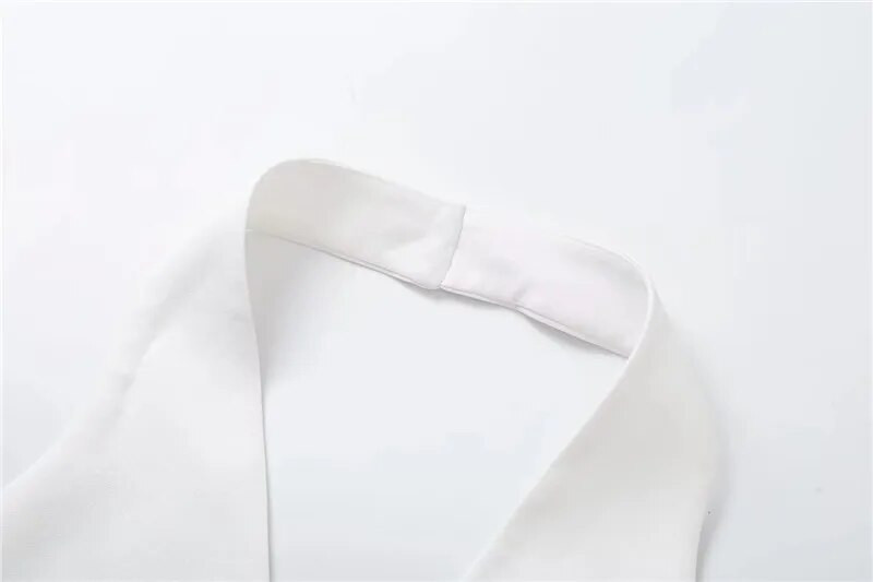 Moteriškos mados gėlės balta liemenė su V kaklu, 2023 m. Seksualūs be rankovių apkarpyti viršutiniai vasariniai elegantiški laisvalaikio striukė su viena krūtine