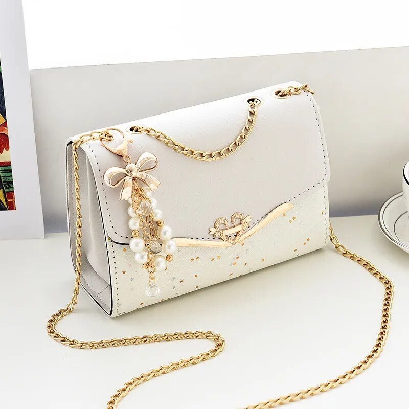 Modna ženska torba na rame Messenger torba Metalni šljokičasti lanac Crossbody telefonske torbe Ženske luksuzne dizajnerske ulične četvrtaste torbe