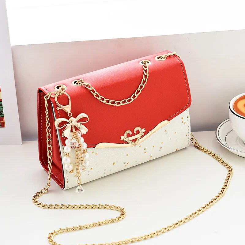 Modna ženska torba na rame Messenger torba Metalni šljokičasti lanac Crossbody telefonske torbe Ženske luksuzne dizajnerske ulične četvrtaste torbe