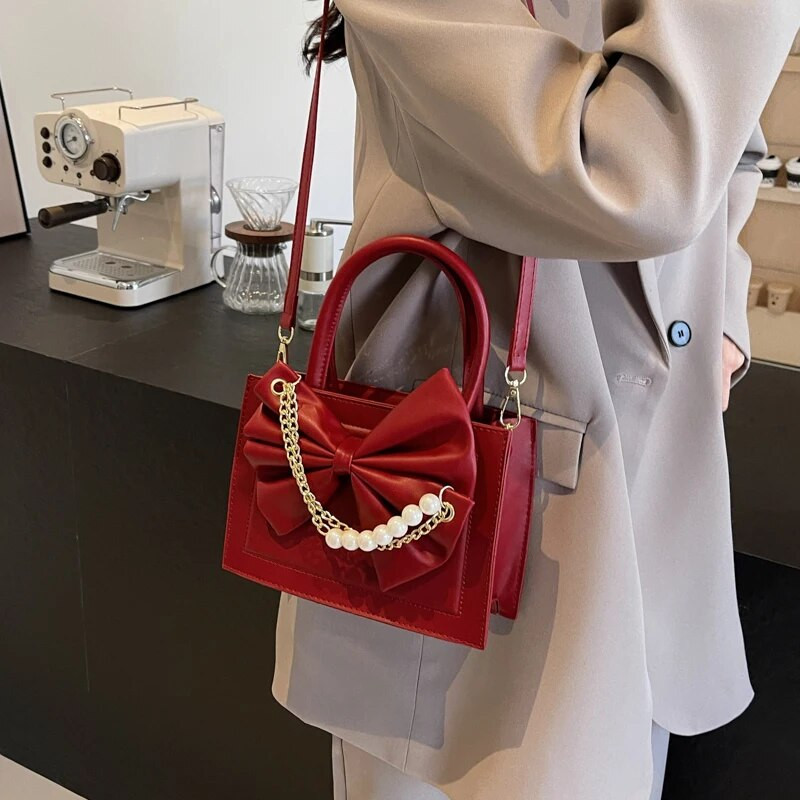 Dizajn lanaca s perlama Ženske torbe s ručkom na vrhu Lagani luksuzni trend Pu torbe preko ramena za žene Moda 2024. Bolsas Femininas