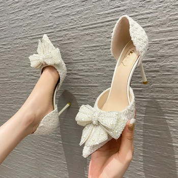 2023 Νέα φθινοπωρινή επώνυμη μάρκα Ψηλά τακούνια πολυτελείας μαργαριτάρι κρύσταλλο παπιγιόν Λευκά παπούτσια γάμου Γυναικεία παπούτσια για πάρτι με λεπτό τακούνι
