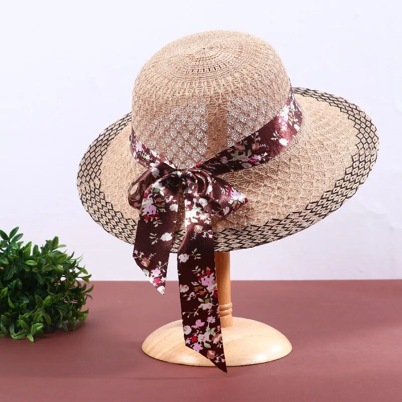 Ženski elegantni šeširi za sunčanje s cvjetnom mašnom i vrpcom Vintage slamnati šeširi Ljetna putovanja Zaštita od sunca Široki obodi Šeširi Odjevni dodaci
