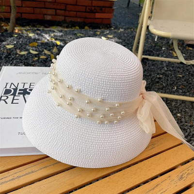 Vintage napernyős sapka női Hepburn stílusú ünnep Elegáns gyöngy masni temperamentum nyári szalmakalap divat anti-UV strandkalap