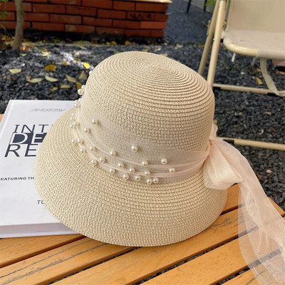 Vintage napernyős sapka női Hepburn stílusú ünnep Elegáns gyöngy masni temperamentum nyári szalmakalap divat anti-UV strandkalap