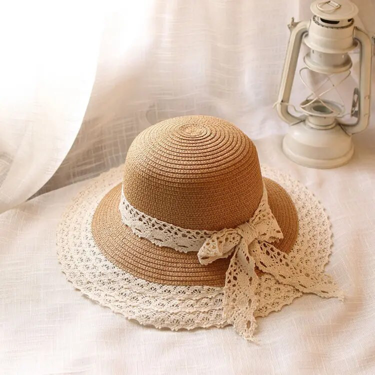 Modni ljetni slamnati šešir Čipkani šeširi za plažu Ženski korejski vjetrootporni šešir Putni šešir širokog oboda Elegantni Lolita šešir s kantom Blagdanski