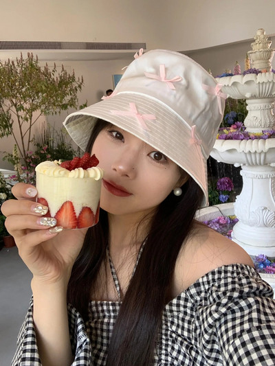 Slatki šešir s mašnom Proljetni i ljetni tanki Ins Svestrani kreme za sunčanje Ženske šeširi Niche dizajner Ležerne Svestrane kape za umivaonik