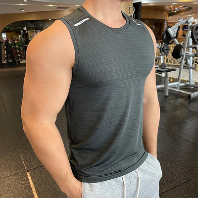 Meeste Kulturismi Tankid Jõusaalitreening Fitness hingav Kiiresti kuivav Varrukateta särk Jooksuvest liibuv elastne treeningspordiala