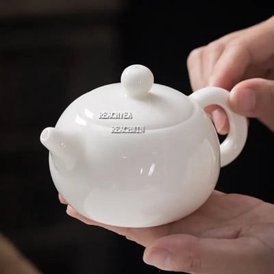 Kínai kézzel készített fehér porcelán teáskanna elefántcsont fehér teáskanna kerámia tea infuser Pu`er Oolong teafilteres teáskanna