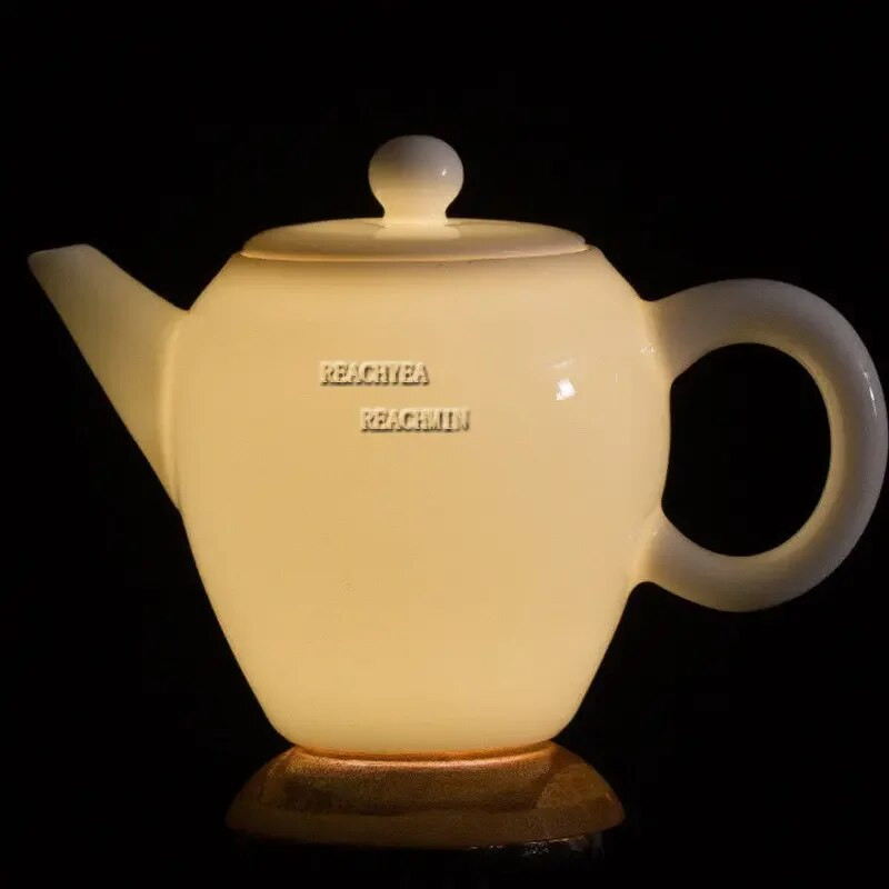 Китайски ръчно изработен бял порцеланов чайник Бяла слонова кост Керамичен чайник за чай Pu'er Oolong Филтърен чайник