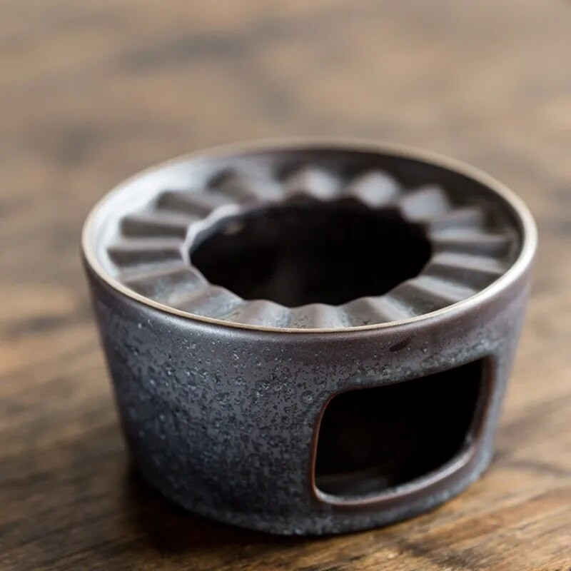 Kompaktiškas keraminis šiltos arbatos viryklės pagrindas gali laikyti įvairius aukštai temperatūrai atsparius puodų izoliacinius daugiafunkcius priedus