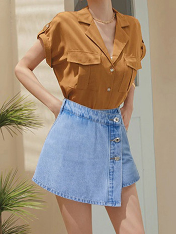 Γυναικεία καθαρή κοντή τζιν φούστα με σκίσιμο μόδας 2023 Καλοκαίρι Ευρωπαϊκή & Αμερικάνικη μόδα Γυναικεία κουμπιά Γλυκό ψηλόμεσο σορτς