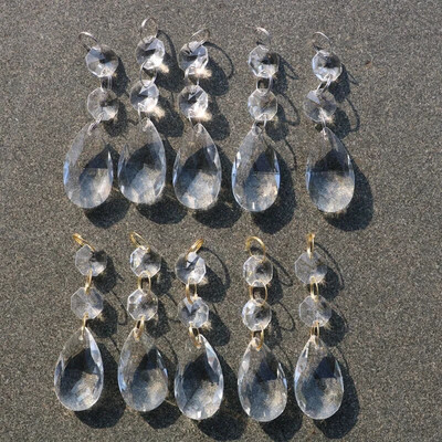 Skaidrūs liustra stiklo kristalai lempos prizmės dalys kabantys lašai pakabukai su krištoliniais aštuonkampiais karoliukais apšvietimo dalys