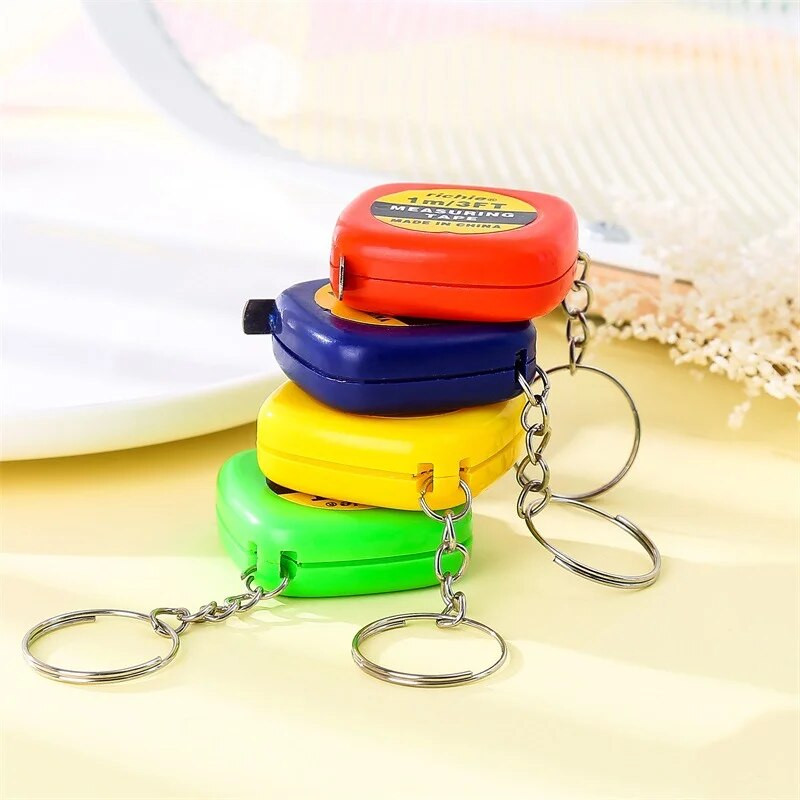 1 KOM. Slatki alat za privjeske za automobile od 1 metra, popularni mini mjerni metar, prijenosni privjesak za ključeve, nasumična boja