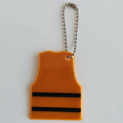 Kollase vestiga helkur võtmehoidja pehme PVC liiklusohutuse ripatsitarvikud liikluse nähtavuse ohutuse tagamiseks Kasutage koti võtmehoidja võlu