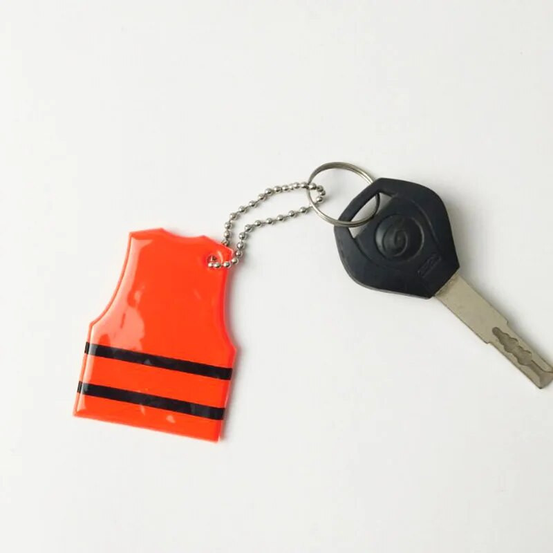 Kollase vestiga helkur võtmehoidja pehme PVC liiklusohutuse ripatsitarvikud liikluse nähtavuse ohutuse tagamiseks Kasutage koti võtmehoidja võlu