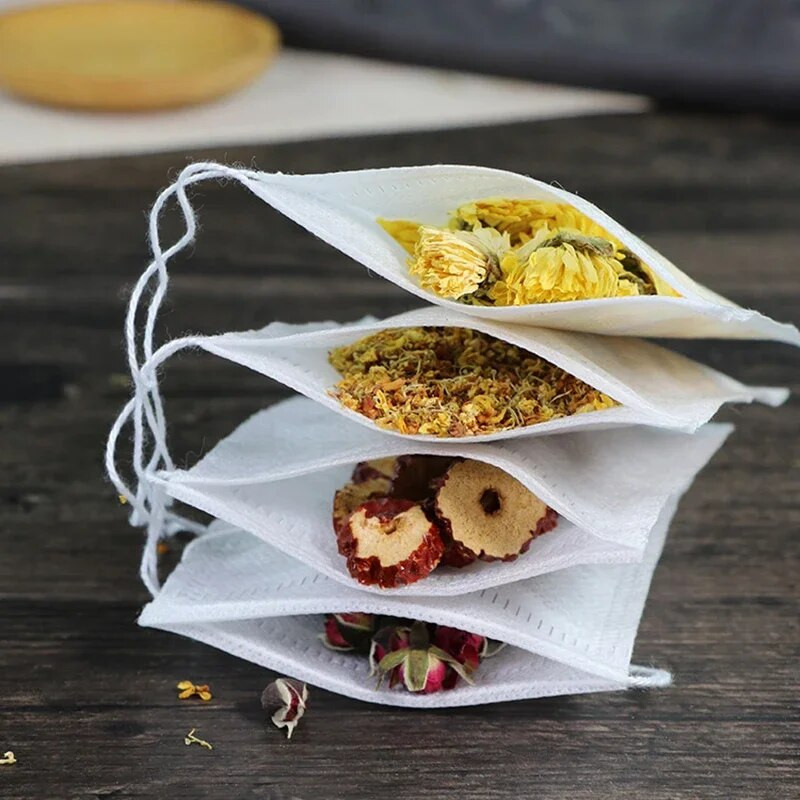 20/50/100 vnt. vienkartiniai arbatos maišeliai Neaustiniai arbatos filtrų maišeliai prieskoninei arbatai su virveliniu filtravimo popieriumi žolelių arbatai