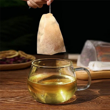 Чаени торбички за еднократна употреба Биоразградима хартиена филтърна торбичка за чай с връв заздравяващо уплътнение Празна връв за подправка Чай на прах от листа