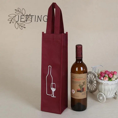 loomingulised pakendikotid paberist kinkekarp nööriga punase veini pudeli jaoks