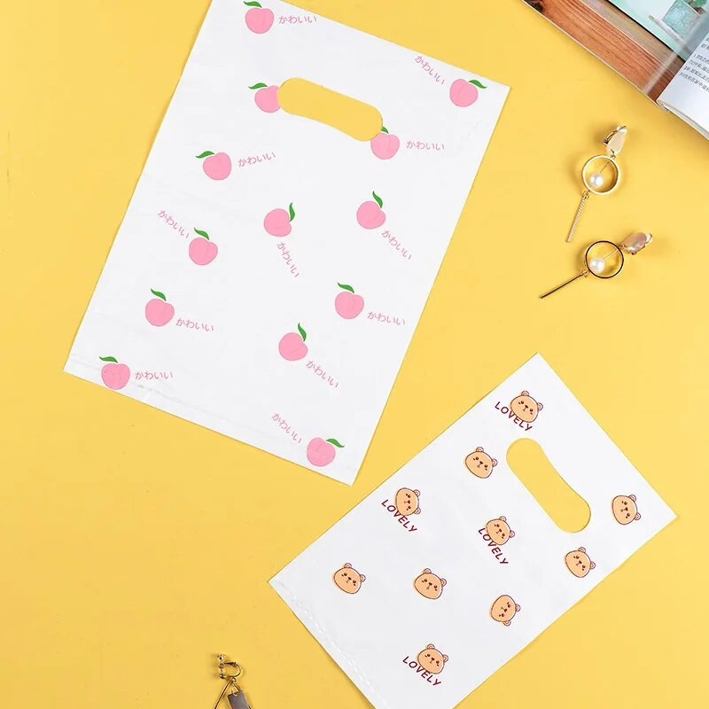 25db/tétel Kis százszorszép átlátszó műanyag zacskó csinos mini vegyes mintás ékszer fülbevaló ékszer ajándéktáska bevásárlótáska