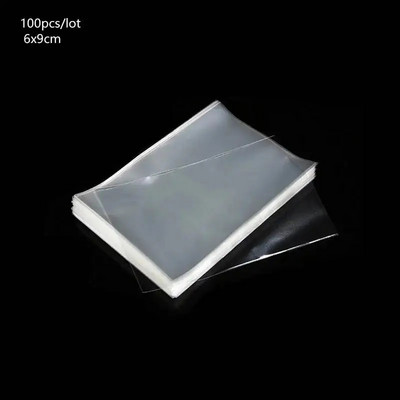 100 tk läbipaistev lame avatud ülaosa kommikott OPP plastikust tsellofaanist kott pulgakommi pakkimine küpsiste pakkimine pulmapeo kinkekotid
