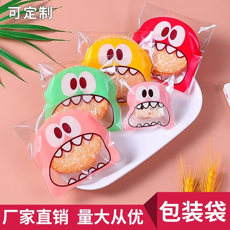 100 db aranyos szörny éles fogak műanyag zacskók karácsonyi ajándék csomagoló táskák esküvői cukorka táska OPP táskák születésnapi húsvéti parti dekoráció