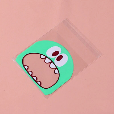 100 TK armsad multifilmid, koletisküpsised, kommid, isekleepuvad kilekotid küpsiste jaoks.