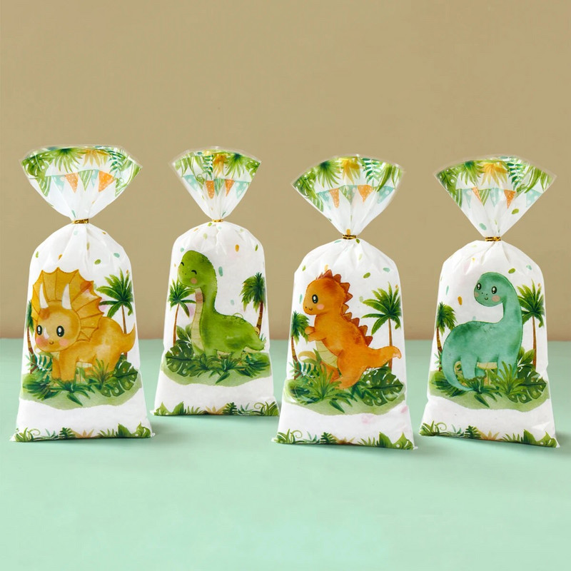 25/50/100db Rajzfilm dinoszaurusz PVC ajándéktasakok cukorka süti csomagoló táska dzsungel dinoszaurusz hableány pillangó születésnapi parti dekoráció