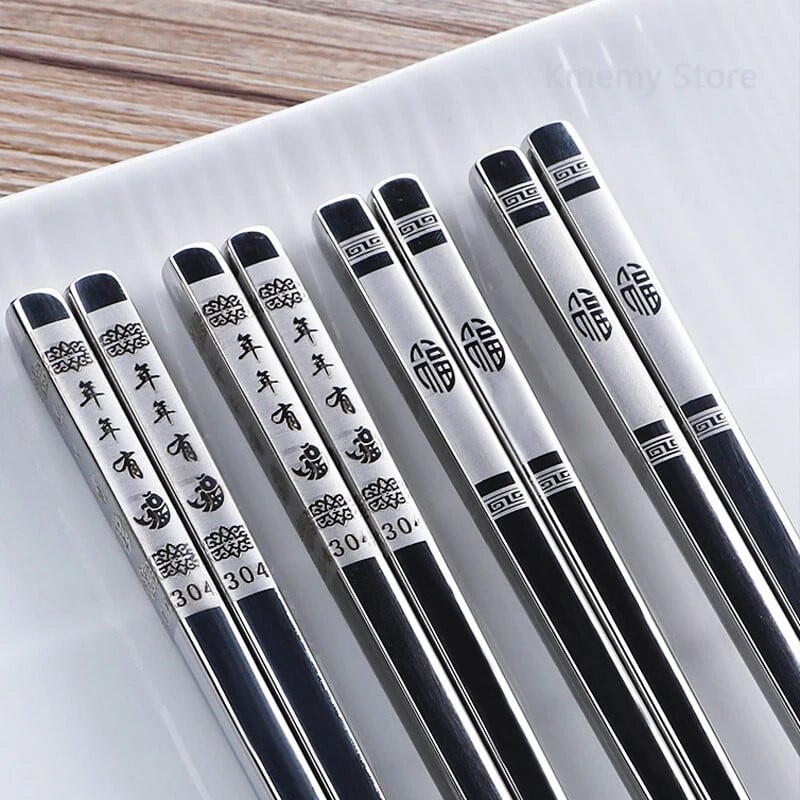 23 cm peen draakoni mustriga söögipulgad 304 roostevabast terasest libisemiskindlad Hiina söögipulgad Toidu-sushipulgad Koduköögi lauanõud