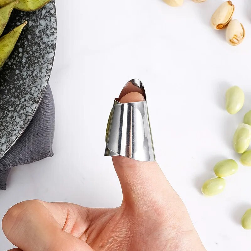 2 tk roostevabast terasest sõrmekaitse puuviljaoad küüslaugukoorija juurvilja pähklid koorimine sõrmekaitse köögi lõikeriistad