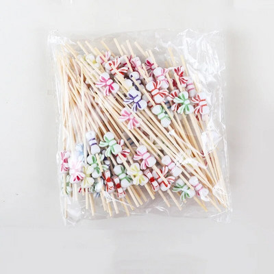 100 db Butterfly eldobható bambusz nyárs Élelmiszer koktél csákány Svédasztalos Gyümölcs Cupcake Villarudak Partiasztal dekorációs kellékek