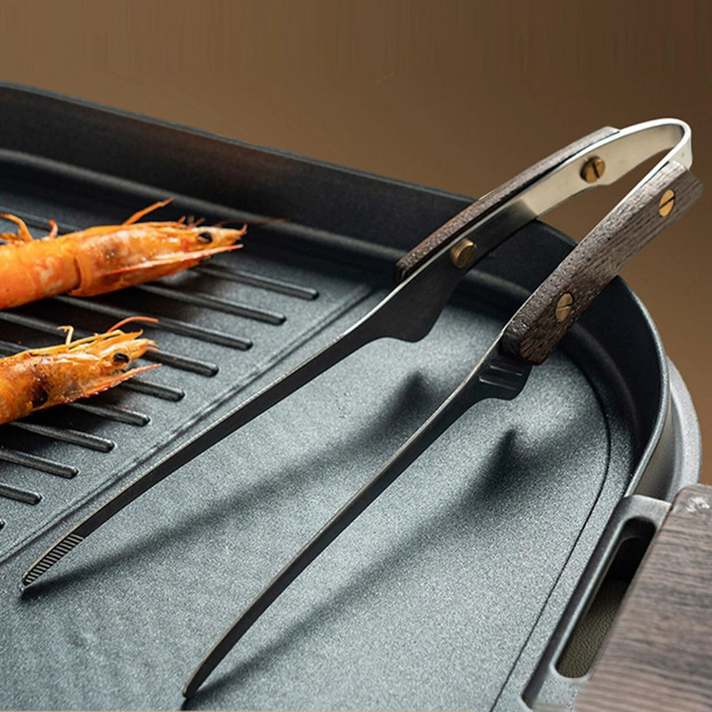 Nerūdijančio plieno kepsninės spaustukai kepsnių kepsnelių segtukai Pradžia Viešbutis Restoranas Duonos kepimo spaustukai Neslystančios medinės rankenos maisto spaustukai