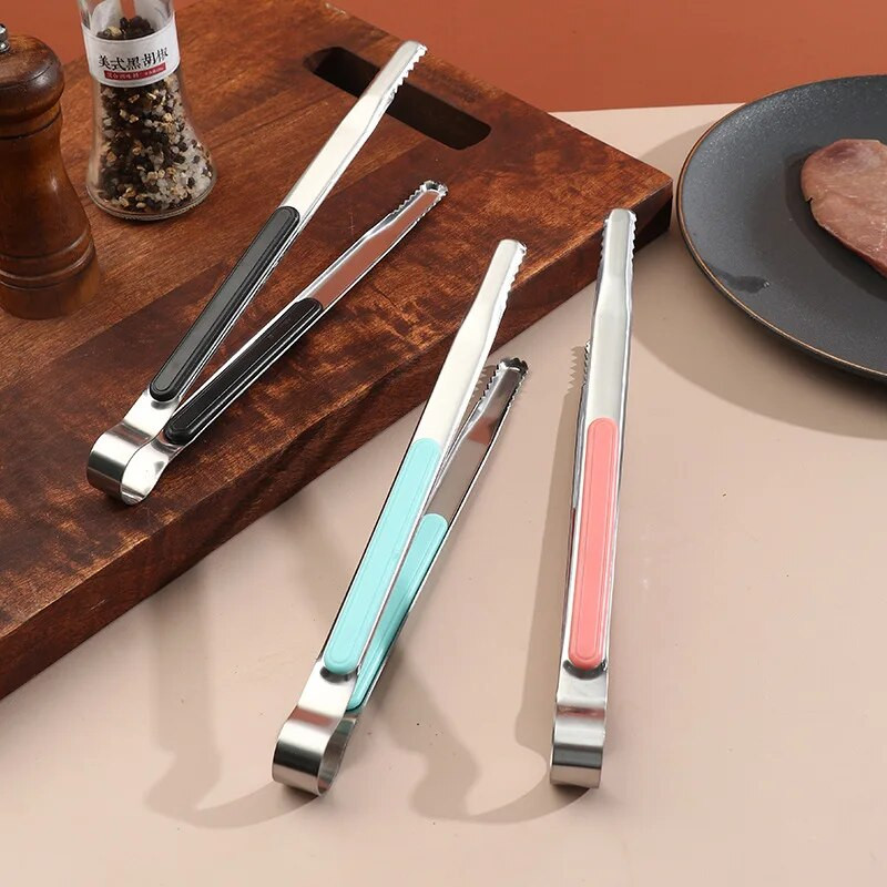 Csúszásmentes, rozsdamentes acél ételfogók Grill Bread Steak tálaló bilincs Otthoni konyhai eszközök főzőedények konyhai kiegészítők