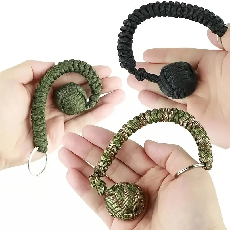 Lauko savigynos skėčio virvė, beždžionių kumščio plieninis rutulys, „Paracord Survival“ raktų pakabukas, lauko saugos priedai