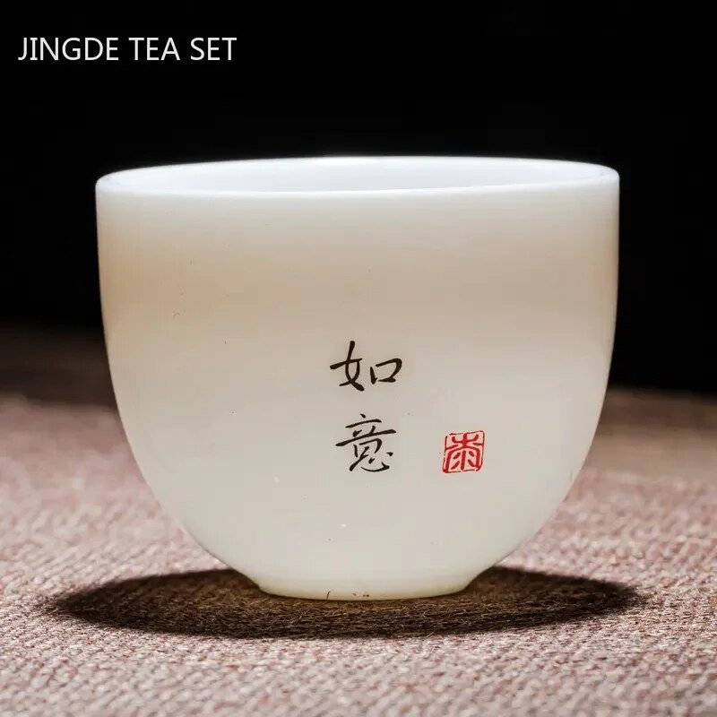 Individualizuotas Dehua ėriuko riebalų nefrito arbatos puodelis Kinijos keramikos vienetiniai puodeliai Buitinis baltos porcelianinės arbatos rinkinys Nešiojamas pagrindinis puodelis
