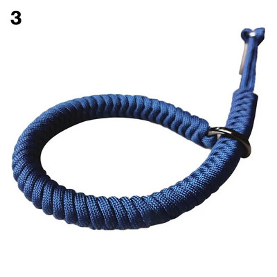 Pretnozaudēšanas kameras plaukstas siksna izturīga izpletņa virve rokas ātri noņemama pārnēsājama dāvanu štrope regulējami āra piederumi