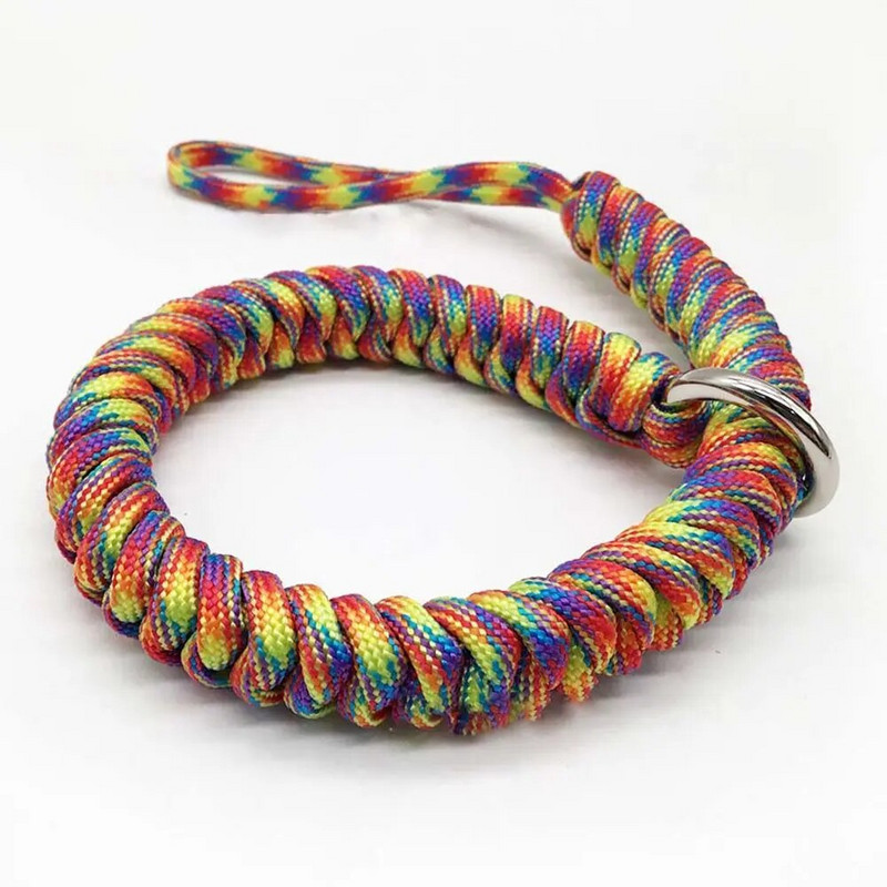 Pretnozaudēšanas kameras plaukstas siksna izturīga izpletņa virve rokas ātri noņemama pārnēsājama dāvanu štrope regulējami āra piederumi