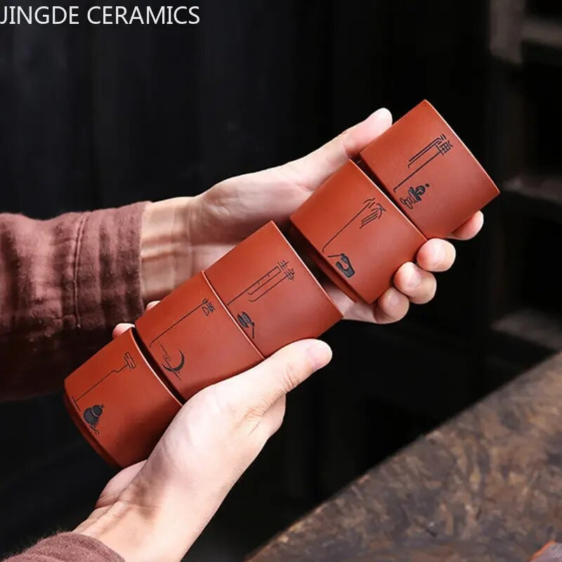 1 db Yixing kézzel készített lila agyag teáscsésze autentikus Dahongpao teástál utazási hordozható pu`er mesterpohár kínai teáskészlet kellékek