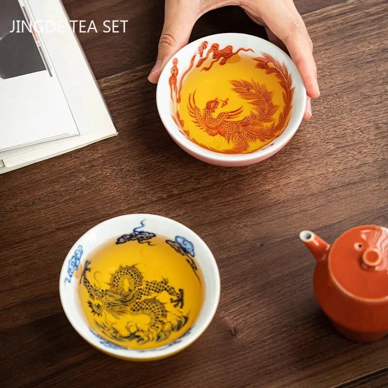 100 ml rankomis dažytas drakono ir fenikso rašto arbatos puodelis Keraminis arbatos dubuo nešiojamasis pagrindinis puodelis Namų asmeniniai arbatos puodelio priedai