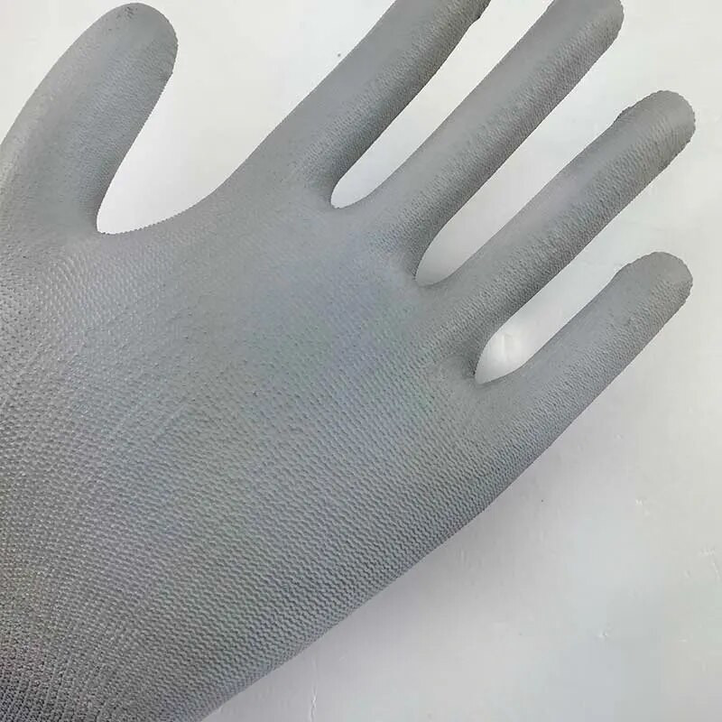 12 porų saugaus darbo pramoninės pirštinės su lengvumu Patogios poliesterio megztos pamušalo panardinimu PU delninės pirštinės