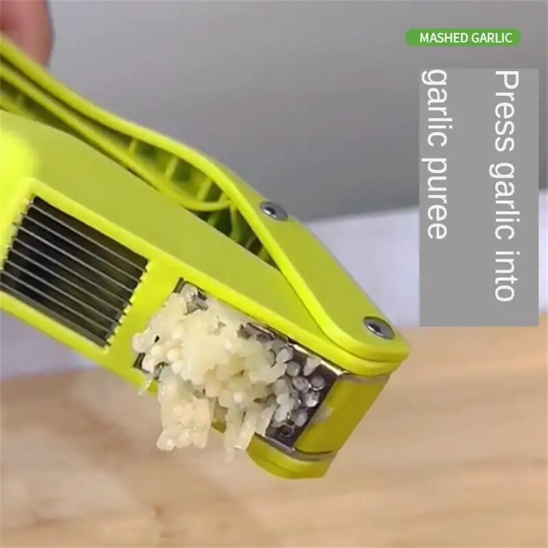 Multifunktsionaalne küüslaugu ingveripressi käeshoitav lihvimismasin roostevabast terasest kujuga köögirullipurusti köögiviljatööriist