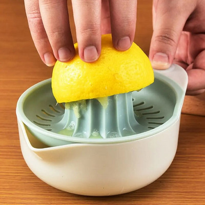 Egészséges, többfunkciós, könnyen tisztítható kézi műanyag citromfacsaró Citrusnyomó Gyümölcsszerszám Narancsfacsaró