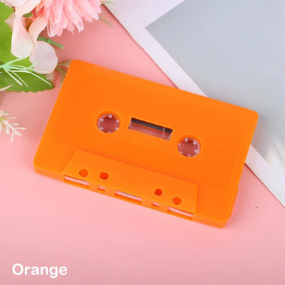 1 vnt. spalvotas tuščias juostos dėklas Garso magnetinė garso įrašymo kasetė Juostos apvalkalas Tuščias ritės į ritę kasetė (be juostos šerdies)